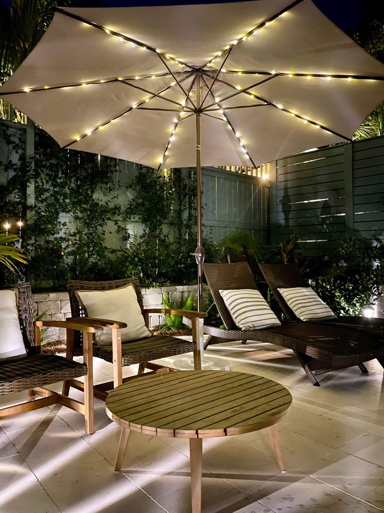 Pool Patio Umbrella Lit Up With Solar LED Lights