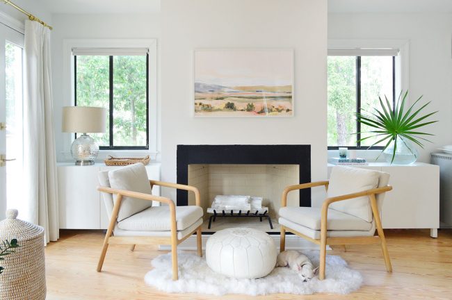 Symmetrical White Ikea Besta Cabinets On Either Side Of Bedroom Fireplace