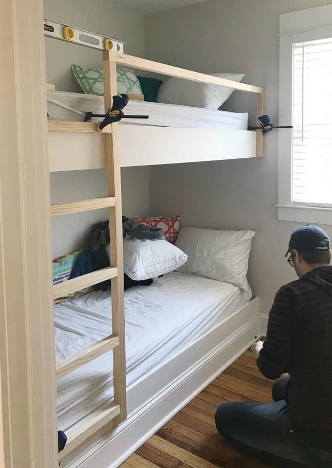 clamps holding diy bunk bed ladder and railings in place