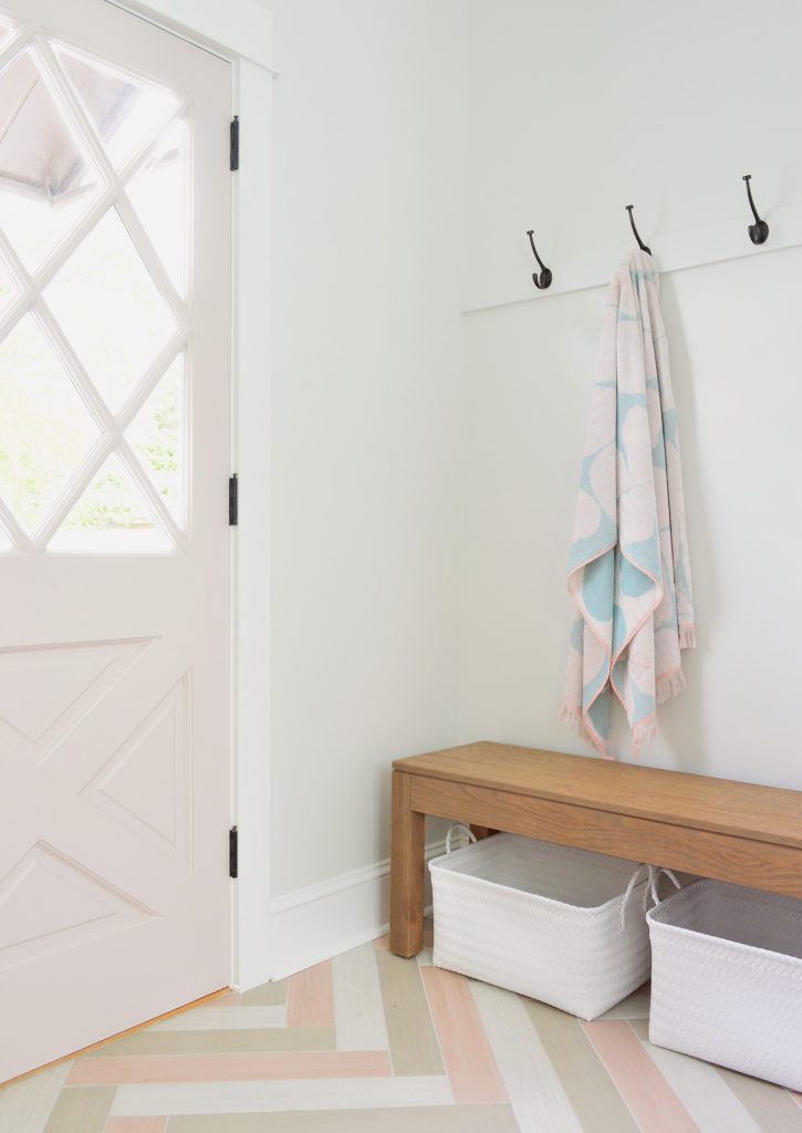 Towel Hook Rail With Pink Diamond Door In Duplex Mudroom With Bench