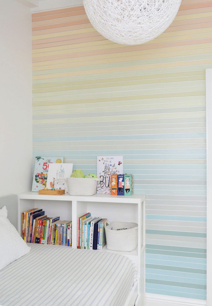 Full View From Ceiling To Floor Of Rainbow Gradient Striped Wall Treatment In Boys Room