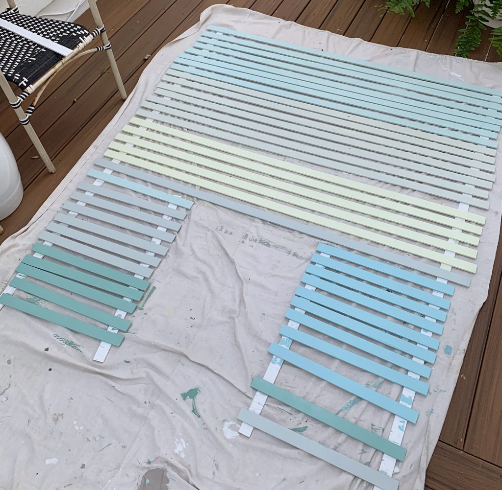 Painted Lattice Strips Laid Out On Deck In Various Blue Green And Gray Colors