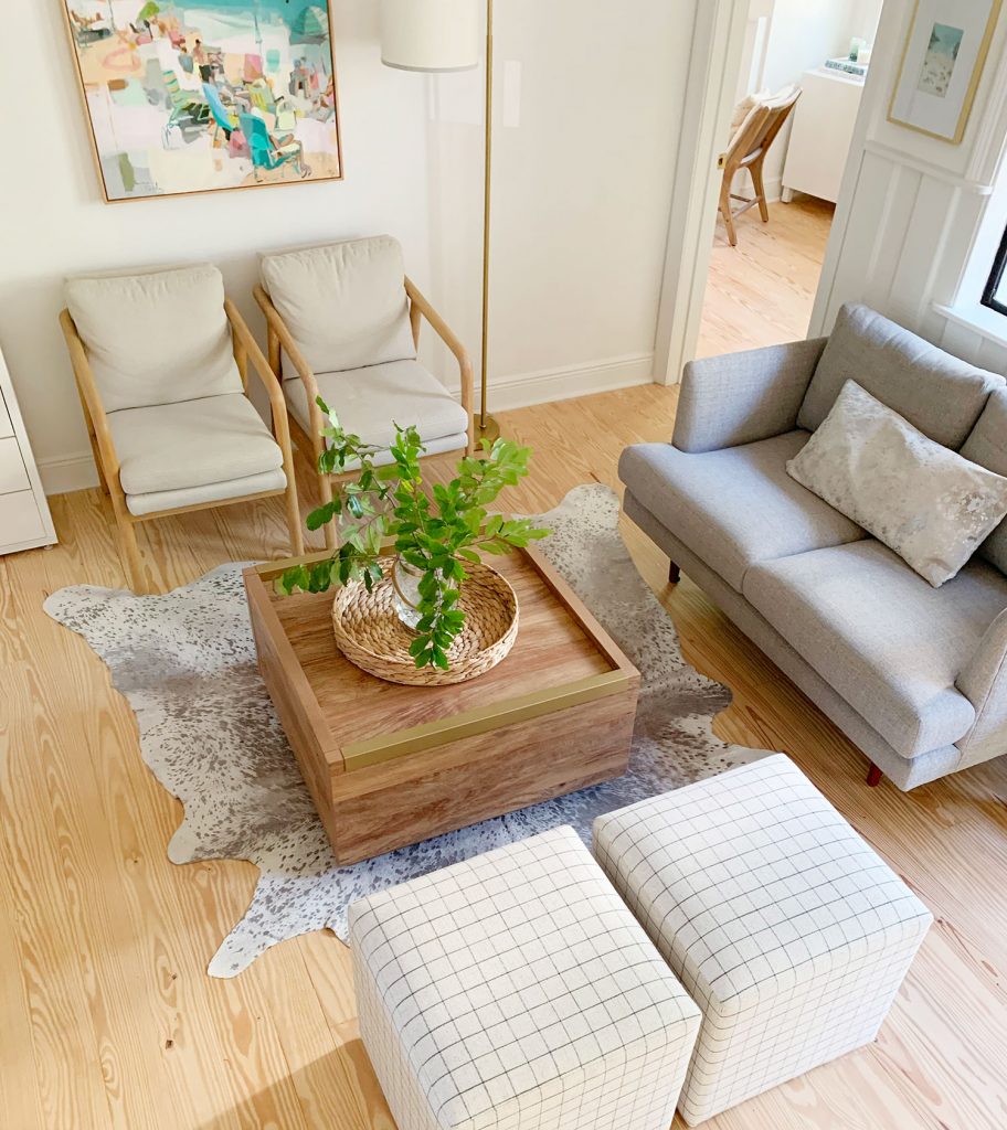 Overhead view of sitting area with wood coffee table in middle