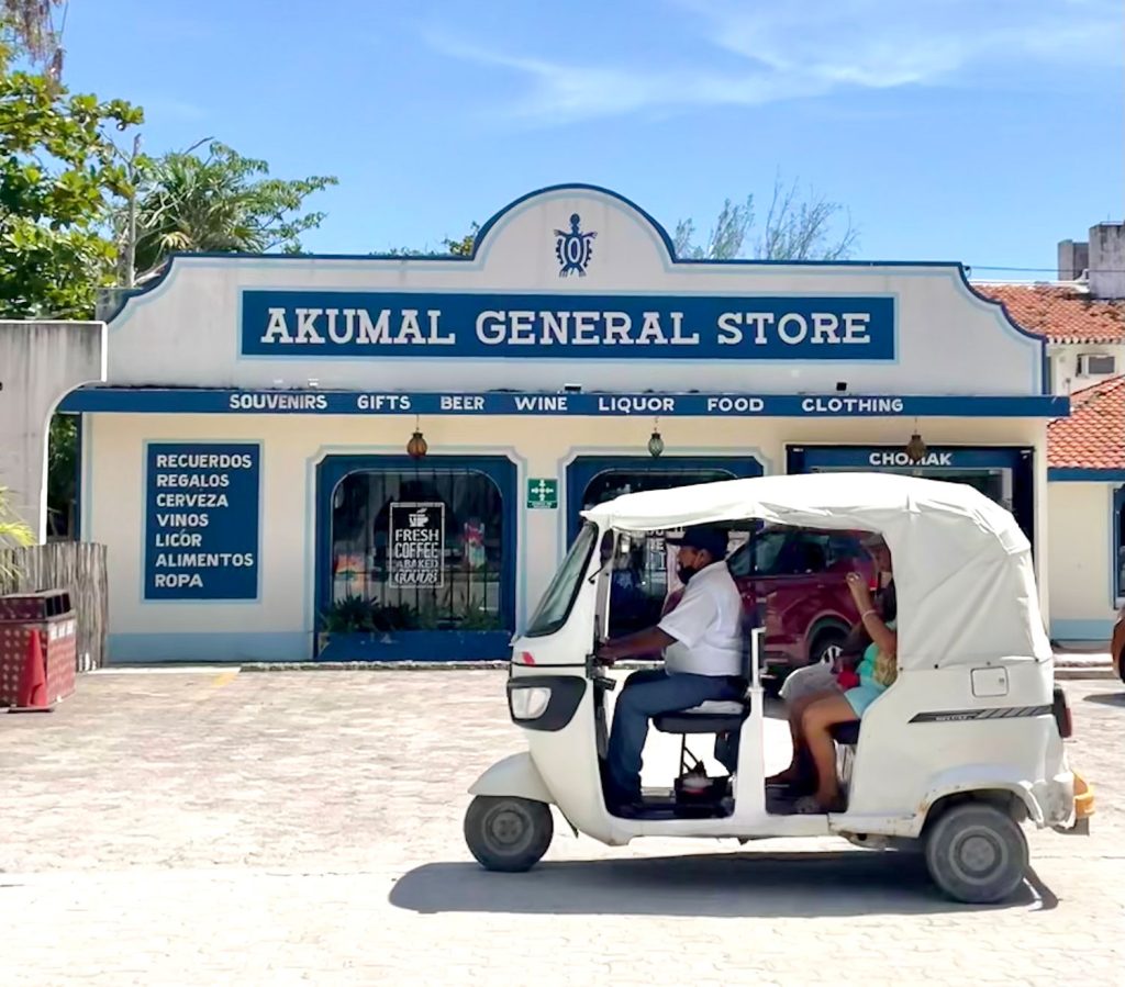 Akumal General Store With Small Taxi In Mexico