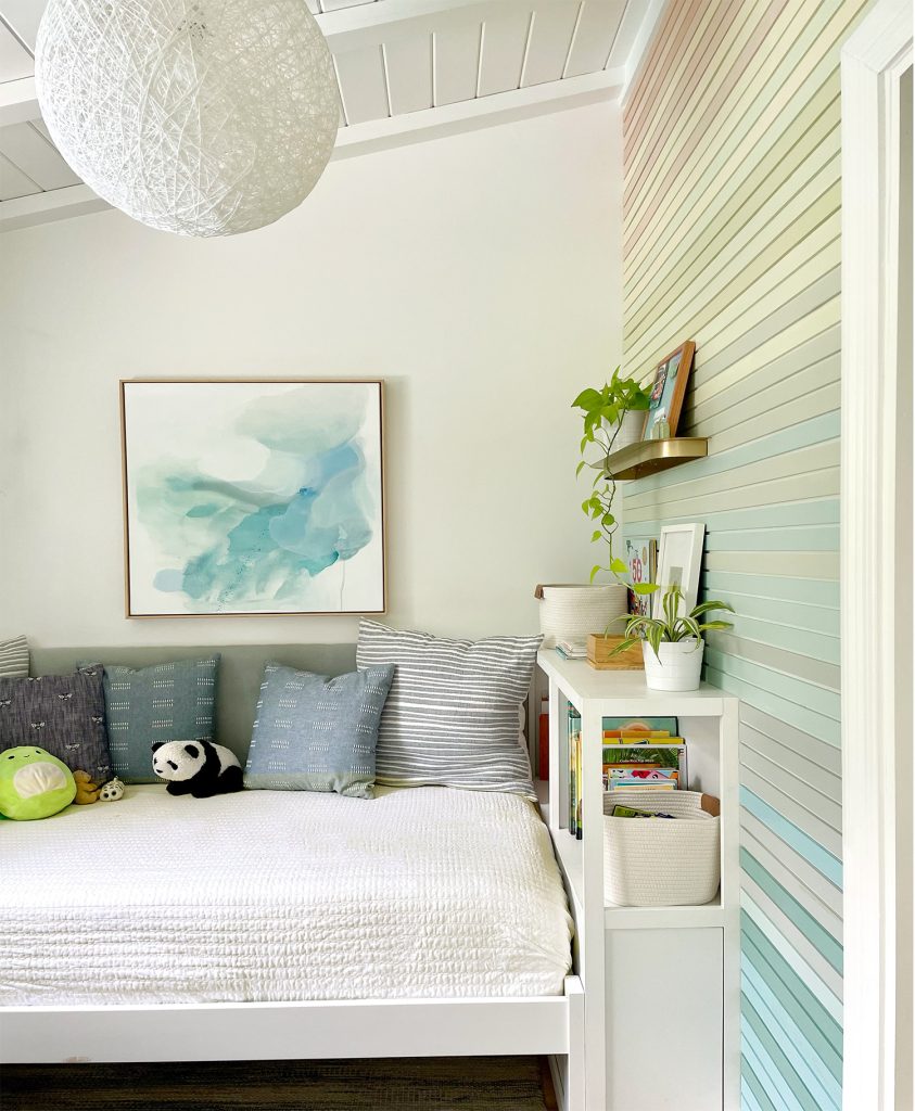 Small Kids Bedroom With Bed With Plush Headboard And Bookcase