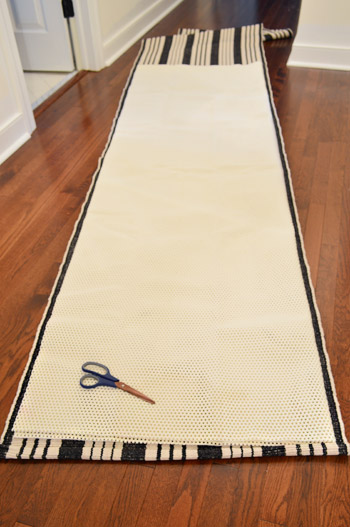 cutting rug pad to the size of a striped stair runner